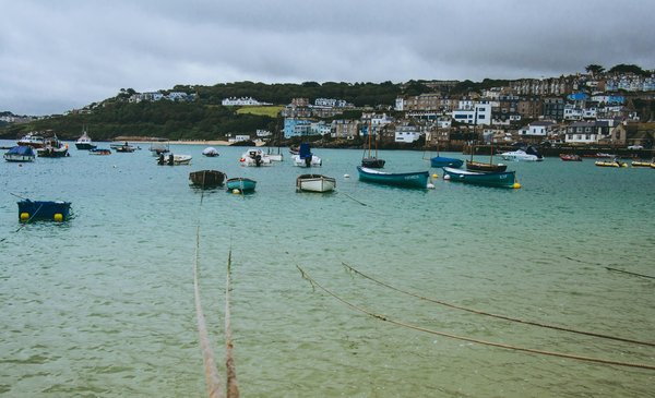 What are the best ways to explore the traditional fishing villages of Cornwall?